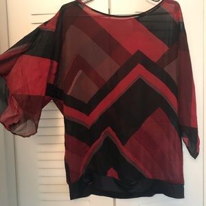 Red and black patterned flowy top, half sleeve